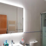 Espejo con lupa de aumento